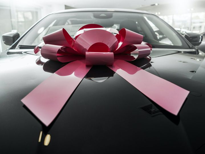 Brand New Elegant Car with Large Gift Bow
