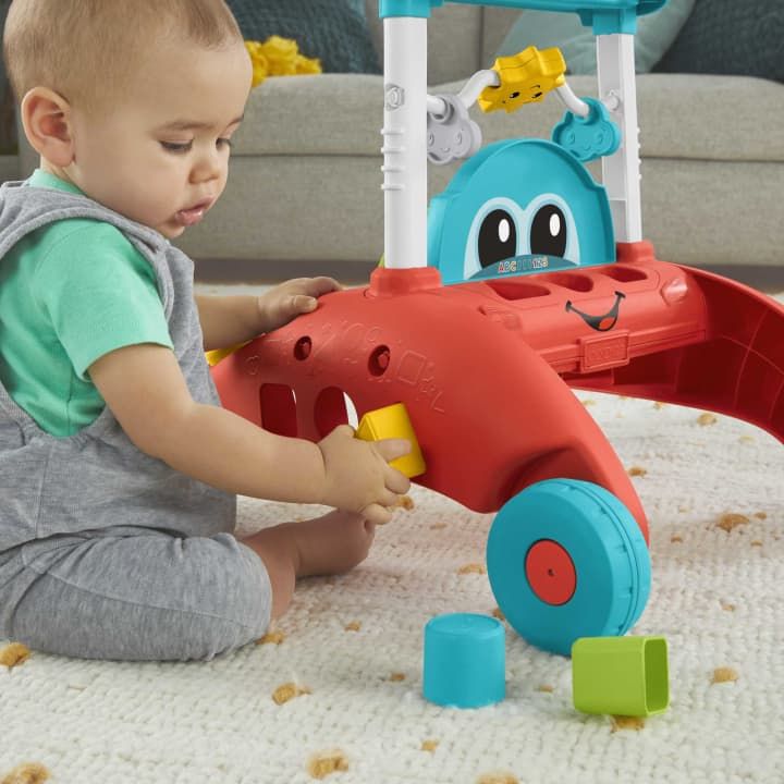 Fisher-Price® „Ucz się i śmiej!“ Pchacz Małego Kierowcy 2w12