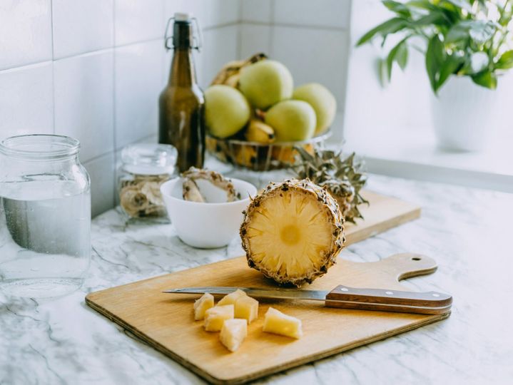 Fermented pineapple kombucha drink tepache. Cooking process of homemade probiotic superfood