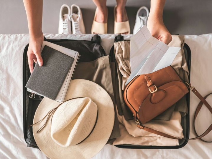 Travel. Staycation.local travel new normal.Girl traveler packing luggage in suitcase Travel,tourism,