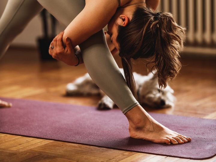 Woman Doing Yoga At Home
