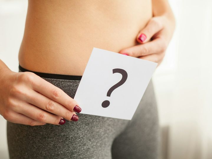 Health. Woman Body In Underwear With Question Card Near Belly