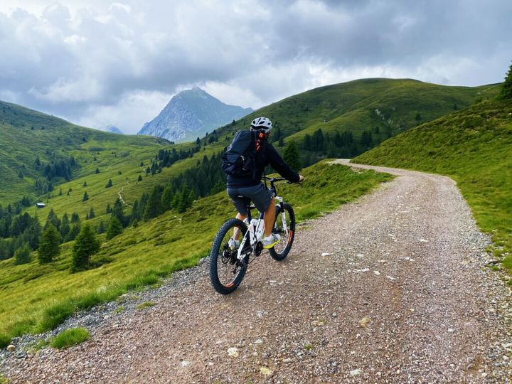 Single mountain bike rider on electric bike