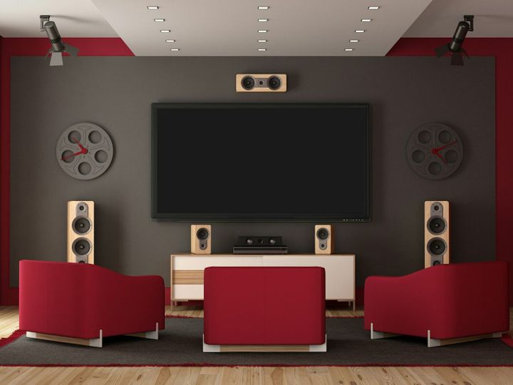 Modern home cinema with flat tv and audio equipment