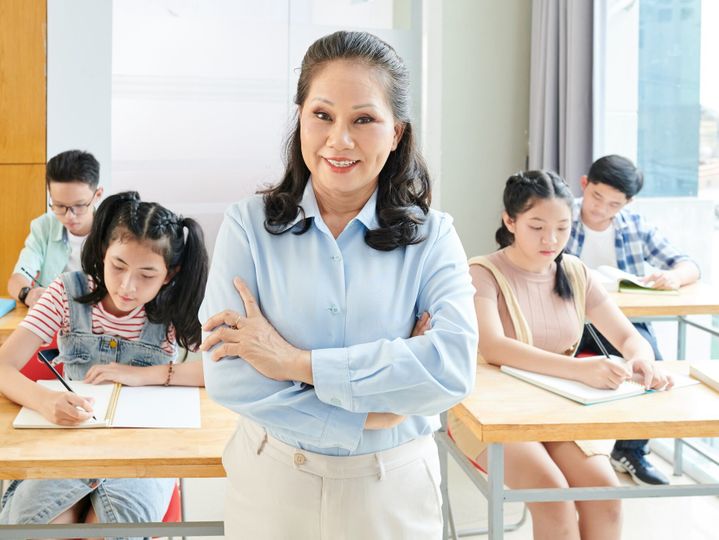 Smiling school teacher