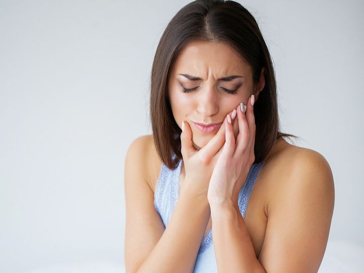 Teeth Problem. Woman Feeling Tooth Pain.