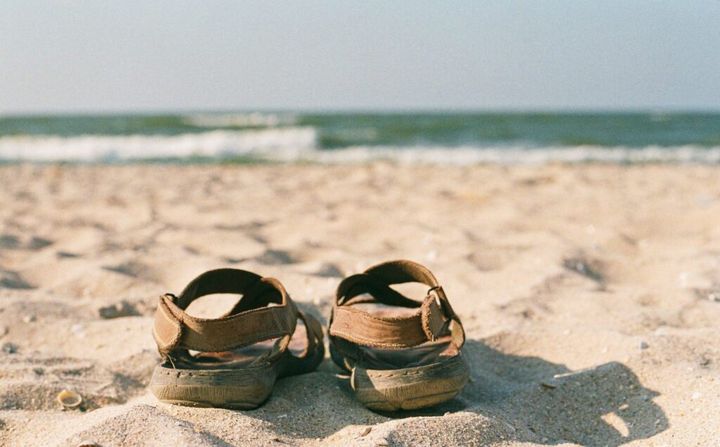 Sandals on the sandy beach