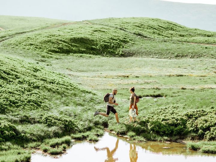 Mountain lake and people traveling