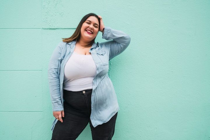 Portrait of young plus size woman.