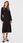 United Colors Of Benetton Sukienka dzianinowa 1244DV00I Czarny Relaxed Fit - zdjęcie 3