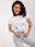 Biały damski t-shirt z napisami BASIC FEEL GOOD - zdjęcie 3