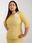 Ciemnożółta elegancka sukienka plus size z rękawem 3/4 - zdjęcie 4
