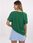 Zielony t-shirt oversize z napisem Manhattan - zdjęcie 2