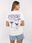 Biały t-shirt z nadrukiem na plecach SUBLEVEL - zdjęcie 4