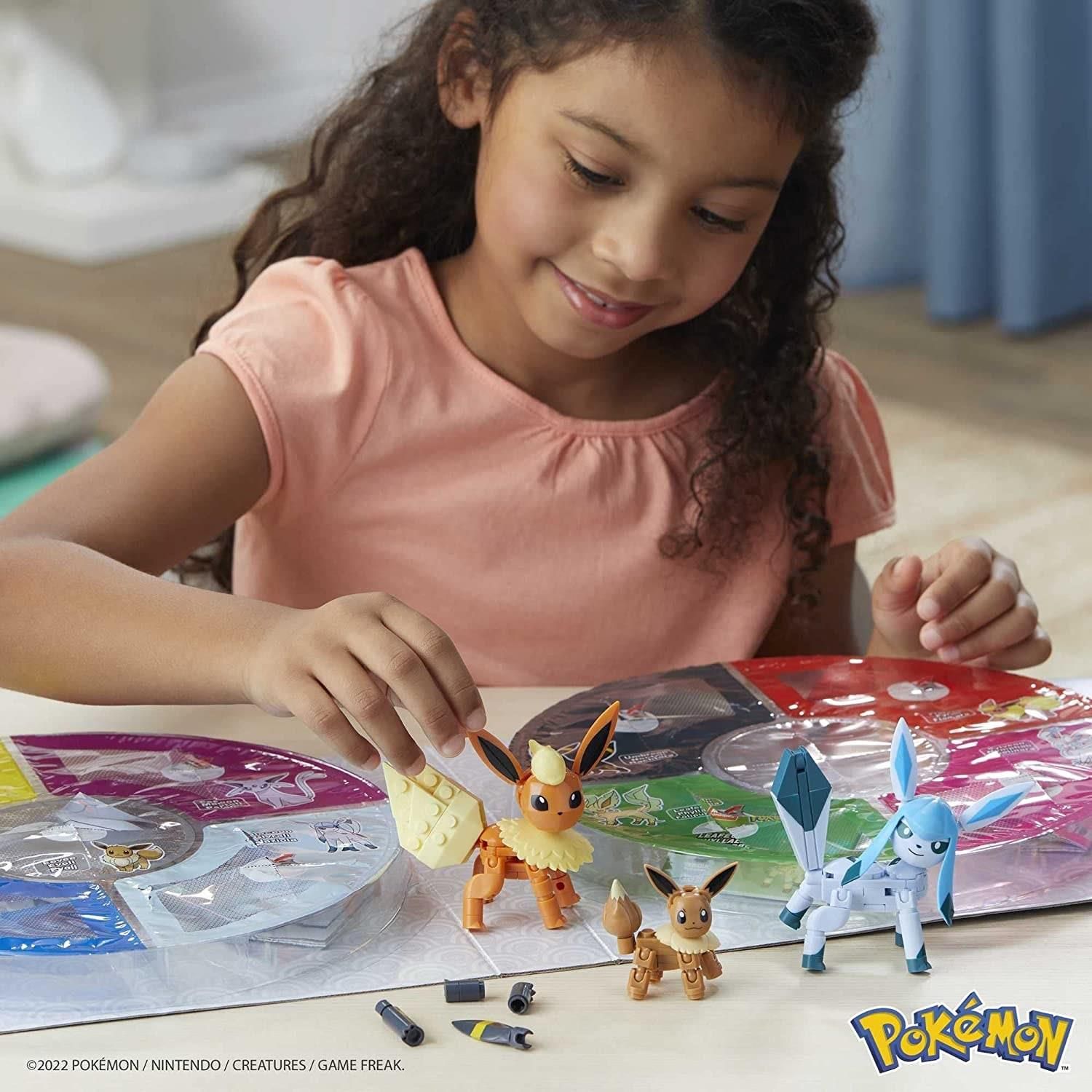 Blocos de Montar Pokémon Evolução Final de Eevee Mega Construx GFV85 Mattel  no Shoptime