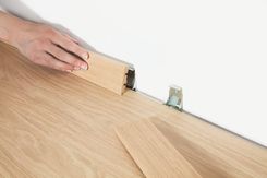 Zdjęcie Quick-Step Klipsy do standardowej listwy przyściennej (QSCLIPSKME95A) - Tyczyn