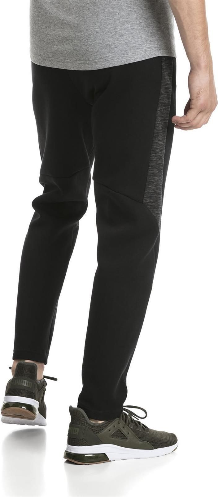 Spodnie dresowe męskie Puma Core Evostripe Pants czarne 85172401 - zdjęcie 3 Spodnie dresowe męskie Puma Core Evostripe Pants czarne 85172401