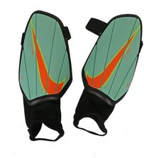 Nike Charge Y SP2165-379 Zielony - Nakolanniki i rękawki do siatkówki