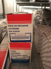 Zdjęcie 16510-66G02-000 FILTR OLEJU ORYGINAŁ OE SUZUKI - Czempiń