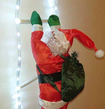 Mikołaj na świecoącej drabinie gwiazdor 100cm ozdoba świąteczna