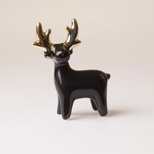 Zdjęcie Czarny mini renifer ze złotymi rogami - Piastów