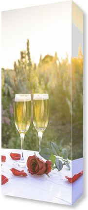 Zakito Posters Obraz 20x50cm Kieliszki do szampana i kosz kwiatów na stole w polu przy zachodzie słońca Assaf Frank