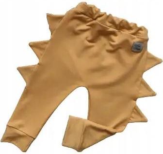 Spodnie musztardowe z kolcami rozmiar 140