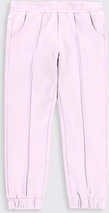 Spodnie dresowe fioletowe z przeszyciami na nogawkach o fasonie REGULAR