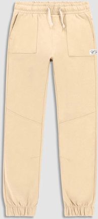 Spodnie dresowe beżowe z kieszeniami o fasonie SLIM