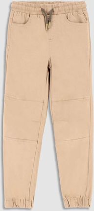 Spodnie tkaninowe beżowe z kieszeniami o fasonie REGULAR