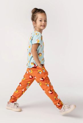 Spodnie dresowe pomarańczowe z kolorowym printem o fasonie REGULAR