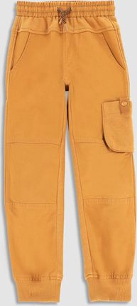 Spodnie tkaninowe miodowe z kieszeniami o fasonie SLIM