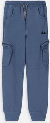 Spodnie dresowe JOGGER niebieskie z kieszeniami na nogawkach