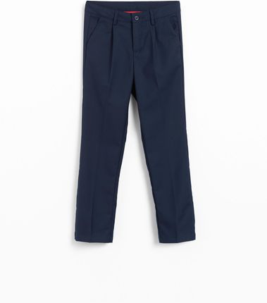 Spodnie tkaninowe eleganckie spodnie garniturowe granatowe z kantem i zaszewkami