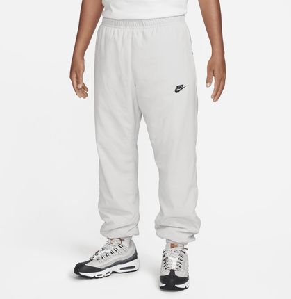 Męskie spodnie z tkaniny na zimę Nike Windrunner - Szary
