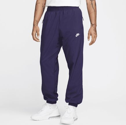 Męskie spodnie z tkaniny na zimę Nike Windrunner - Fiolet