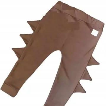 Spodnie taupe z kolcami rozmiar 68