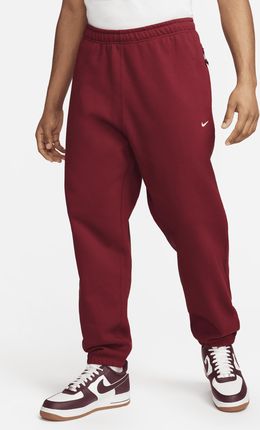 Męskie spodnie z dzianiny Nike Solo Swoosh - Czerwony