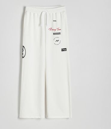 Reserved - Spodnie dresowe z nadrukiem - Biały