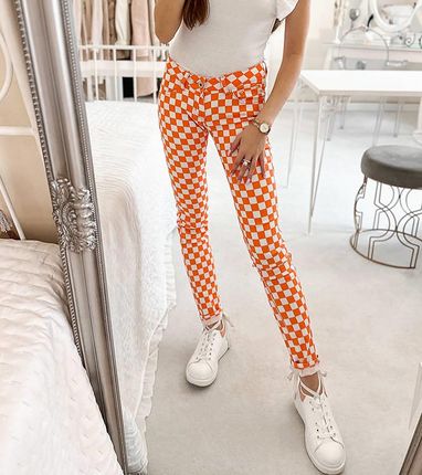 Pomarańczowe spodnie materiałowe w kratę Bler