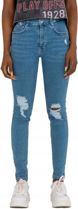 Spodnie jeansowe damskie z dziurami rurki L