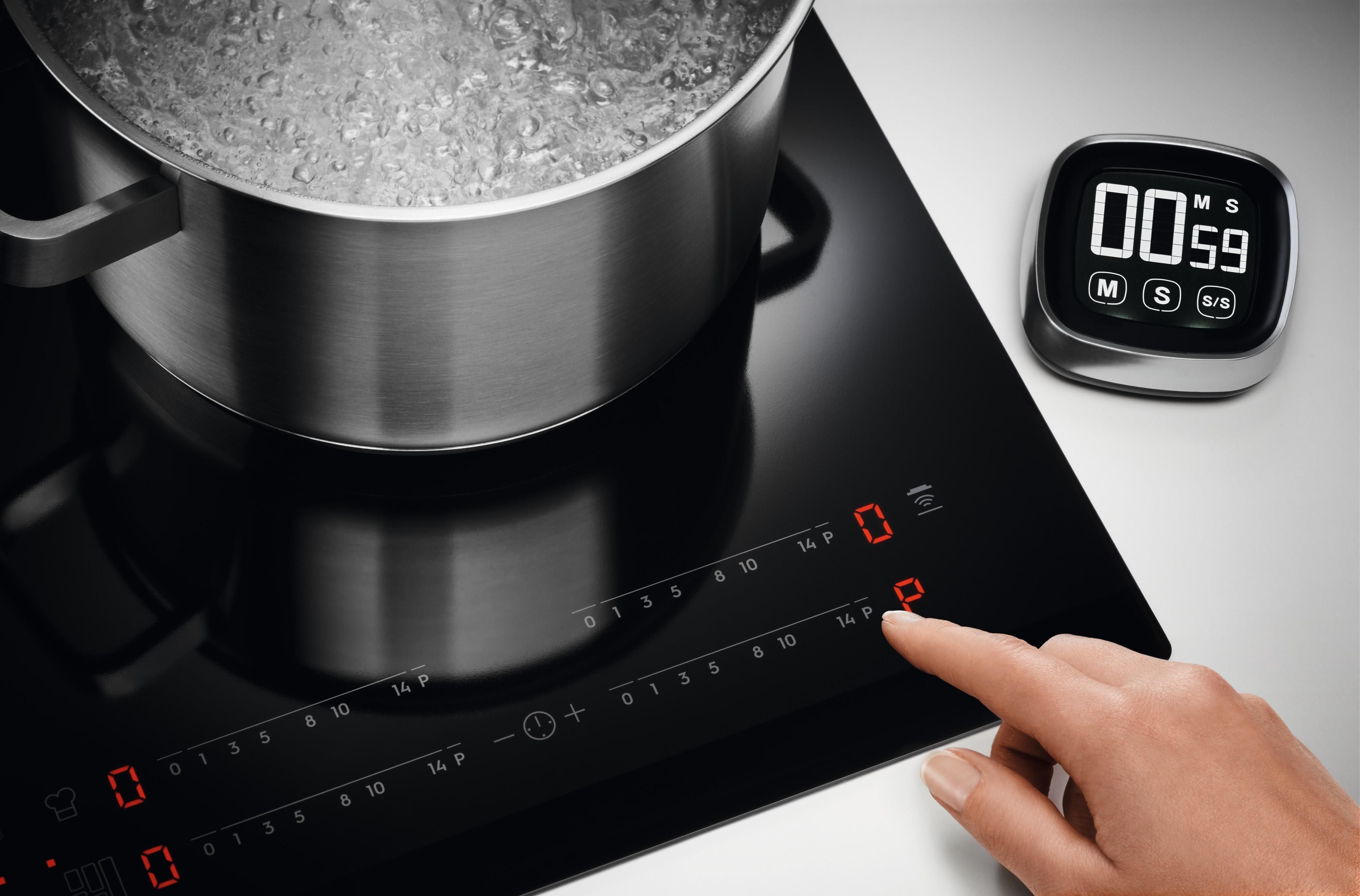 фото Індукційна варильна поверхня Electrolux KIR60433