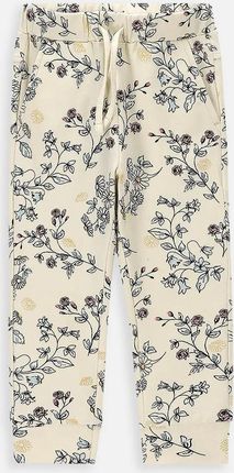 Spodnie dresowe ecru z kieszeniami i kwiatowym wzorem