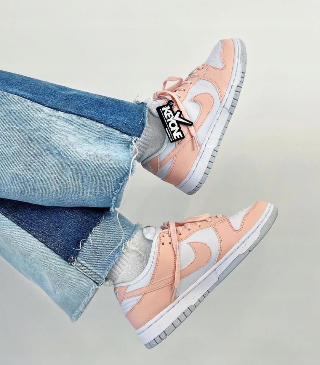 nike dunk low next nature coral