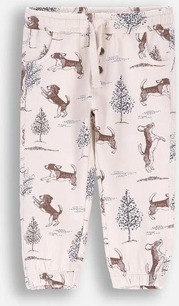 Spodnie dresowe ecru z nadrukiem na całości