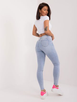 Jasnoniebieskie spodnie jeansowe skinny z aplikacjami - zdjęcie 2
