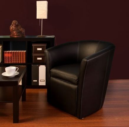 Ekskluzywny fotel, krzesło wykonany z czarnej skóry i szyty białą nicią