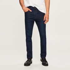 Reserved - Spodnie jeansowe slim fit z przetarciami - Niebieski - zdjęcie 1