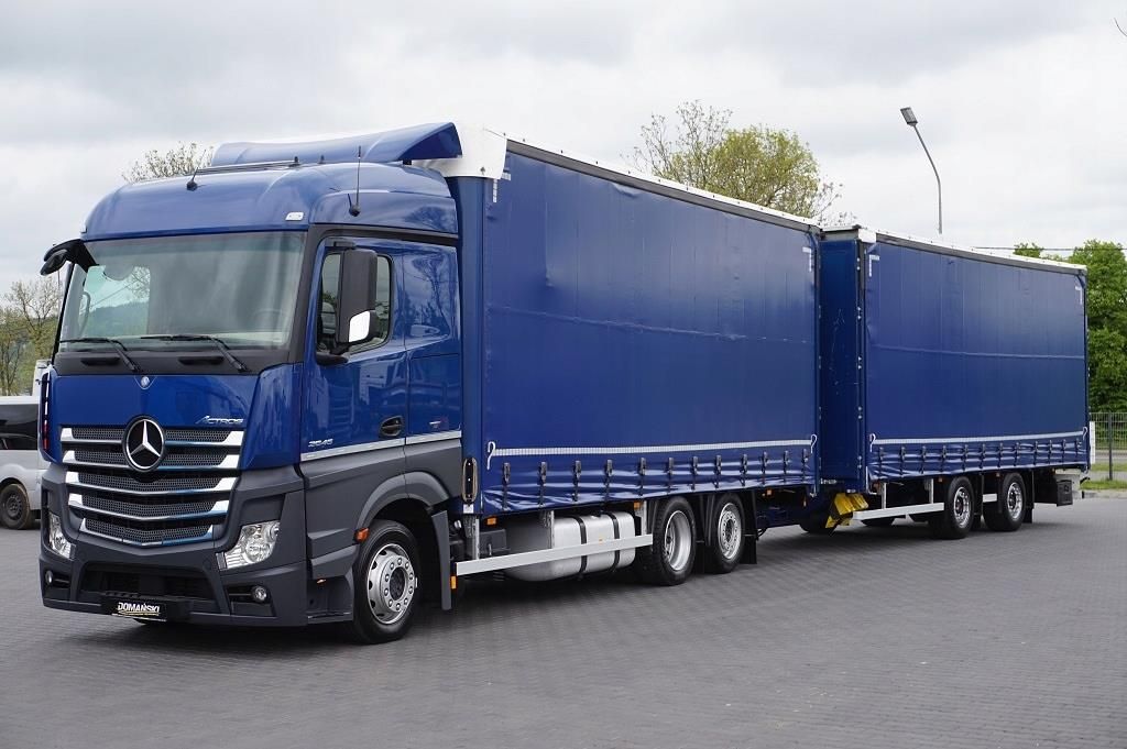 Mercedes-benz actros 20 тонн. Тягач мерседес бенц актрос. Мерседес актрос 1844 с полуприцепом. Мерседес полуприцеп. Актрос с прицепом.