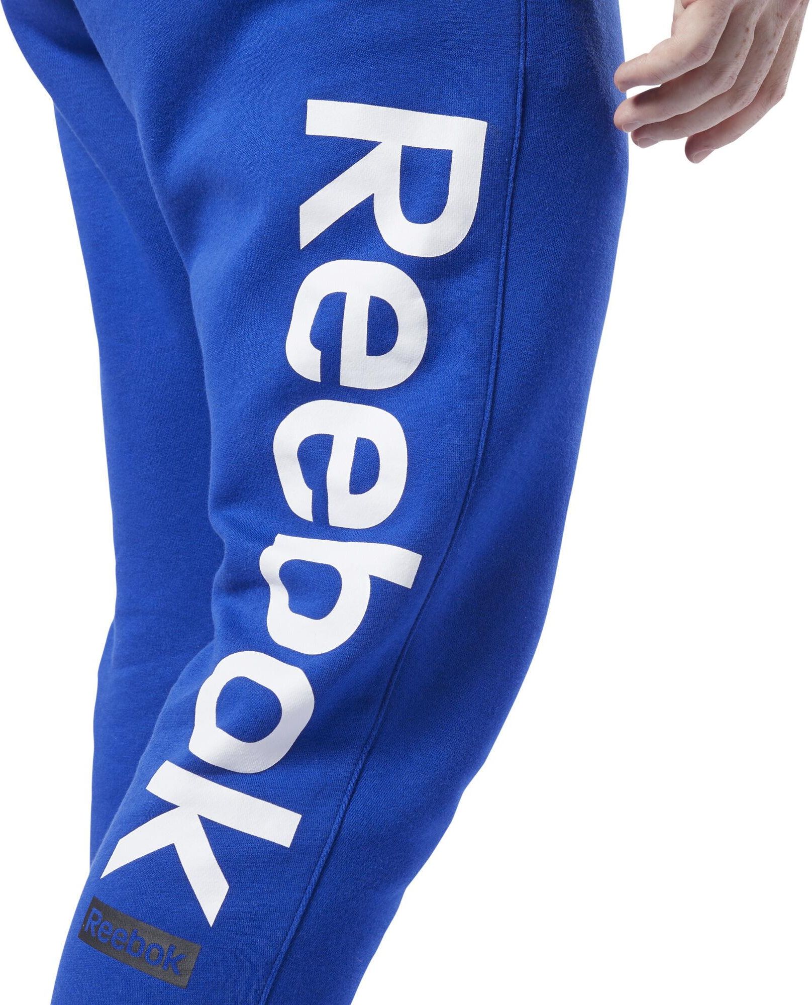 spodnie training essentials logo